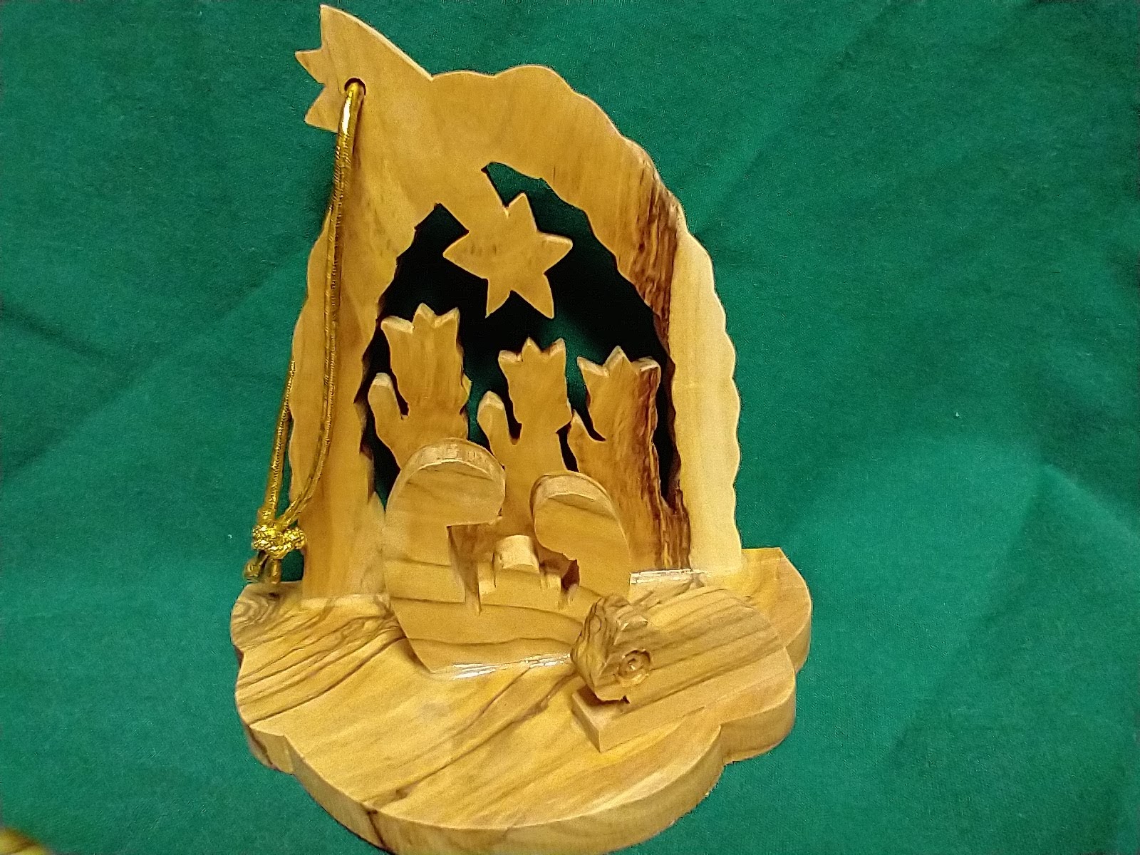 Wood carved nativity ornament