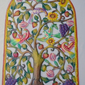 metal arch with birds, flowers, and fruit inside