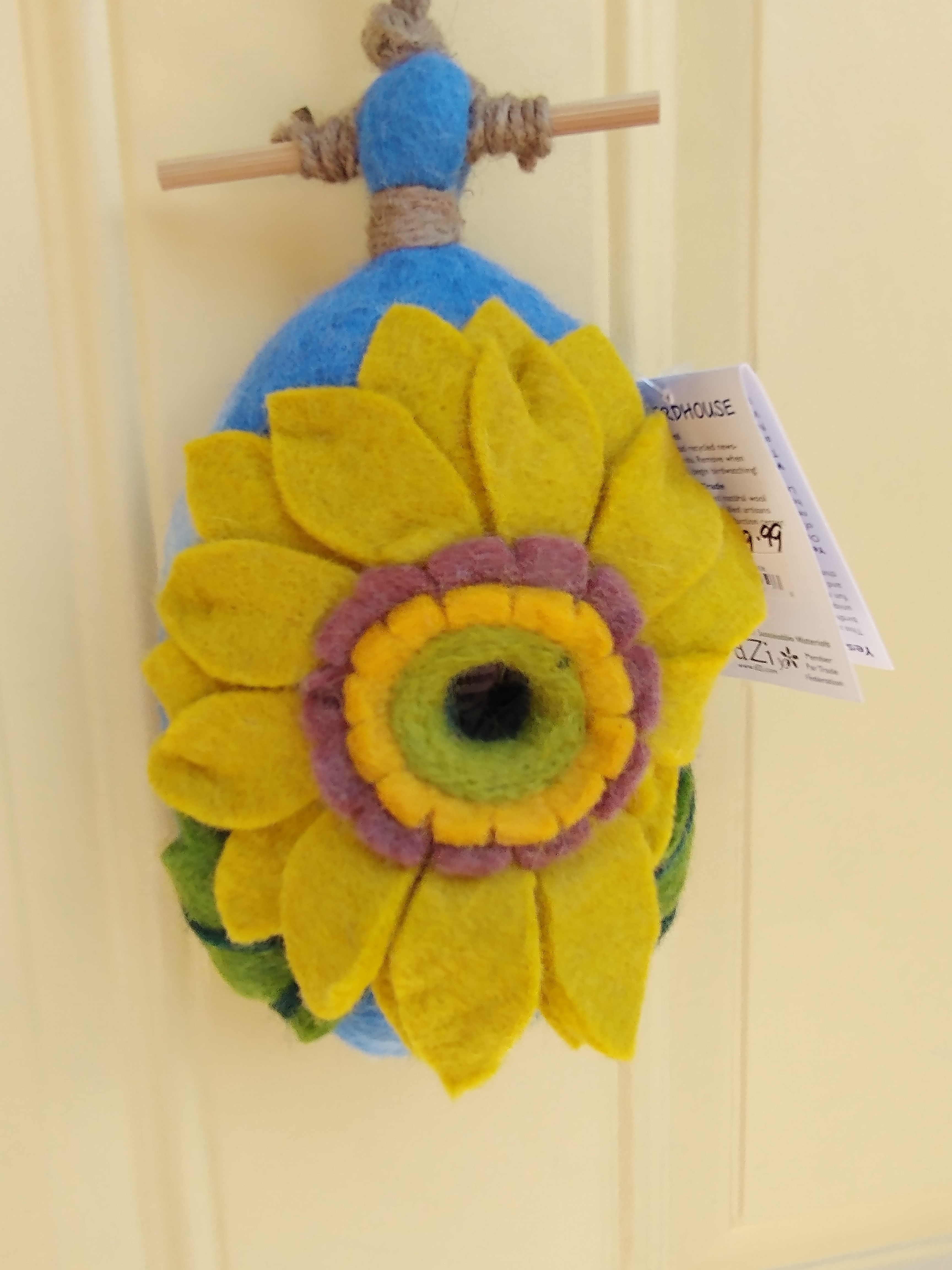 Sunflower-shaped felted wool birdhouse