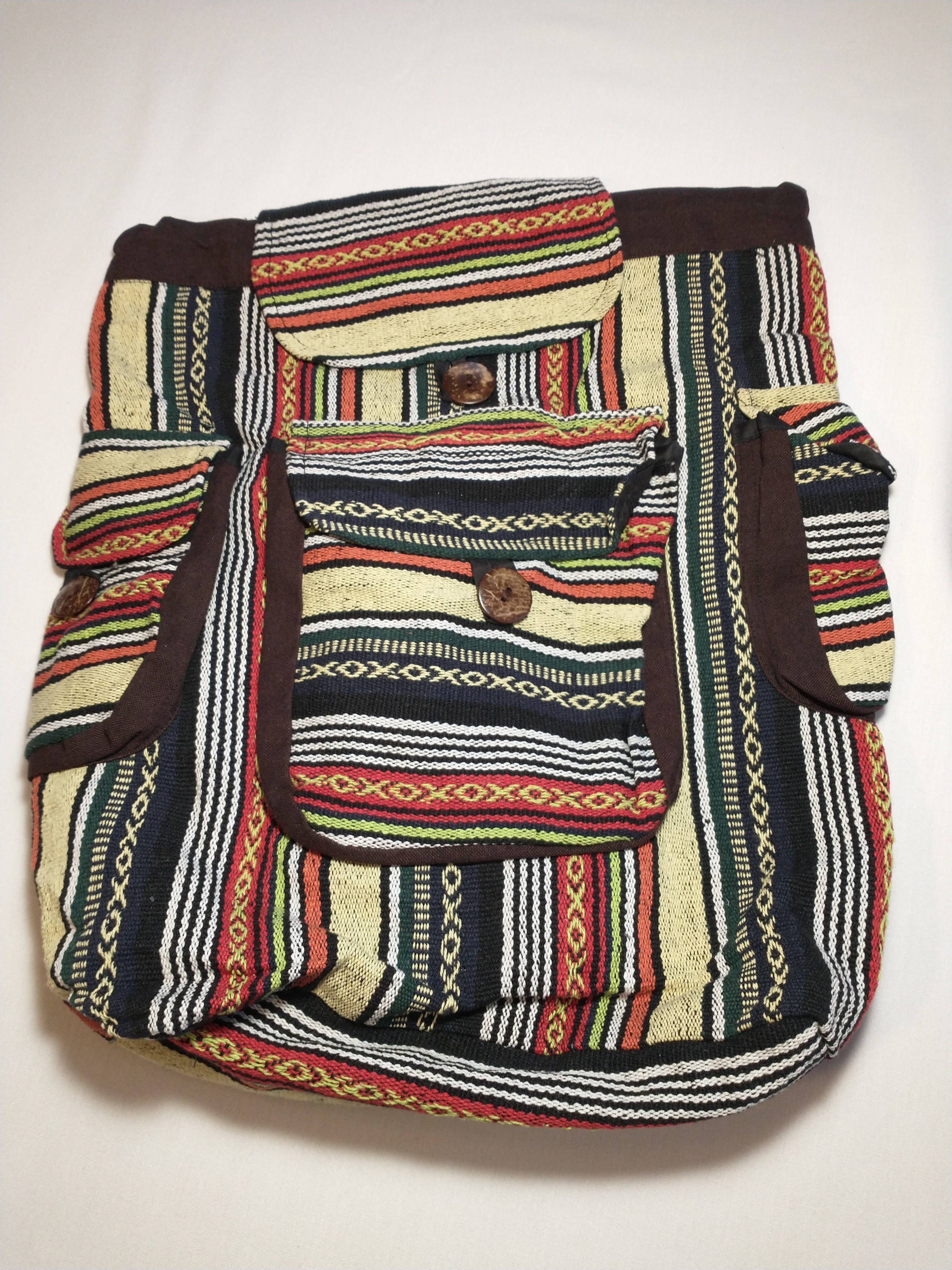 Red, brown, orange, and yellow pattern backpack